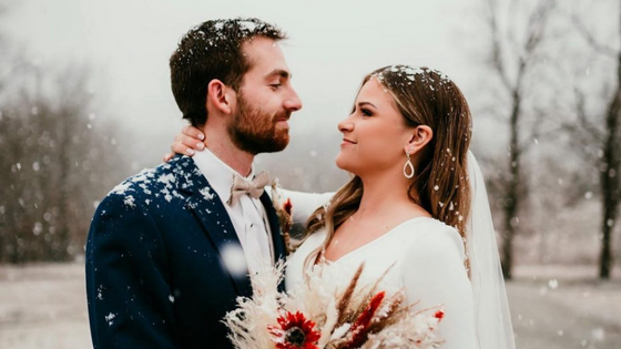 bride and groom in snow